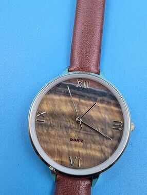 Vintage BWC Tiger's eye quartz watch with (faux) leather band.